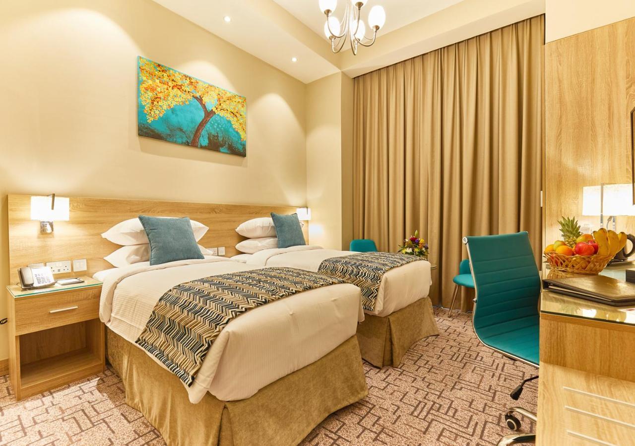 Rose Plaza Hotel Al Barsha ドバイ エクステリア 写真